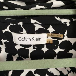 Calvin Klein Size 12. Like New. Black & White Cross body Dress